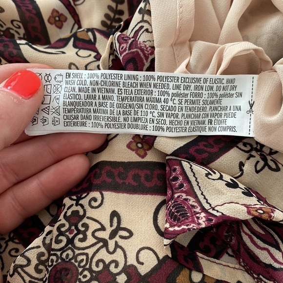 Forever 21 long sleeve boho jumpsuit with plunging neck line. - Picture 8 of 13